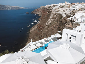 Best hotel in Oia Santorini with caldera views and Infinity pool. Kirini Suites and Spa.