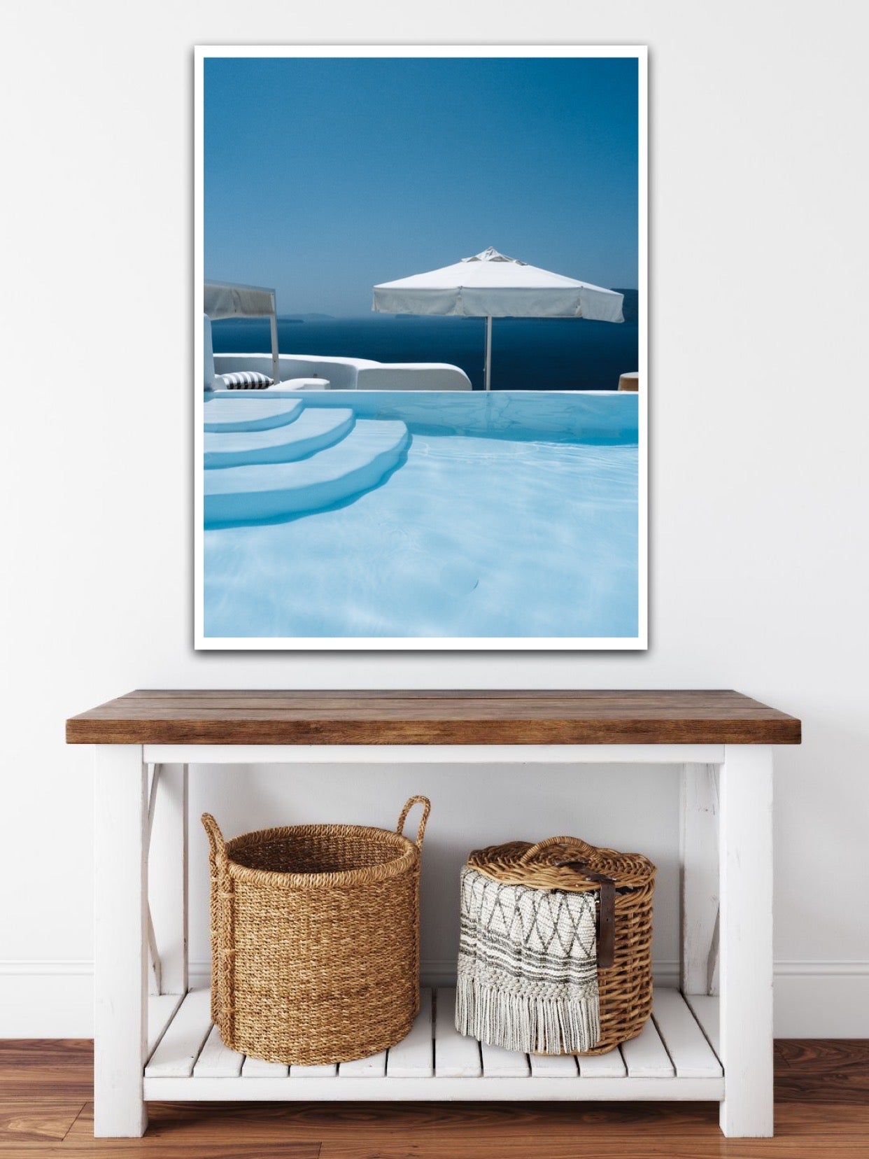 Poolside infinity pool at luxury hotel in Oia Santorini Kirini Suites and Spa.  Caldera views